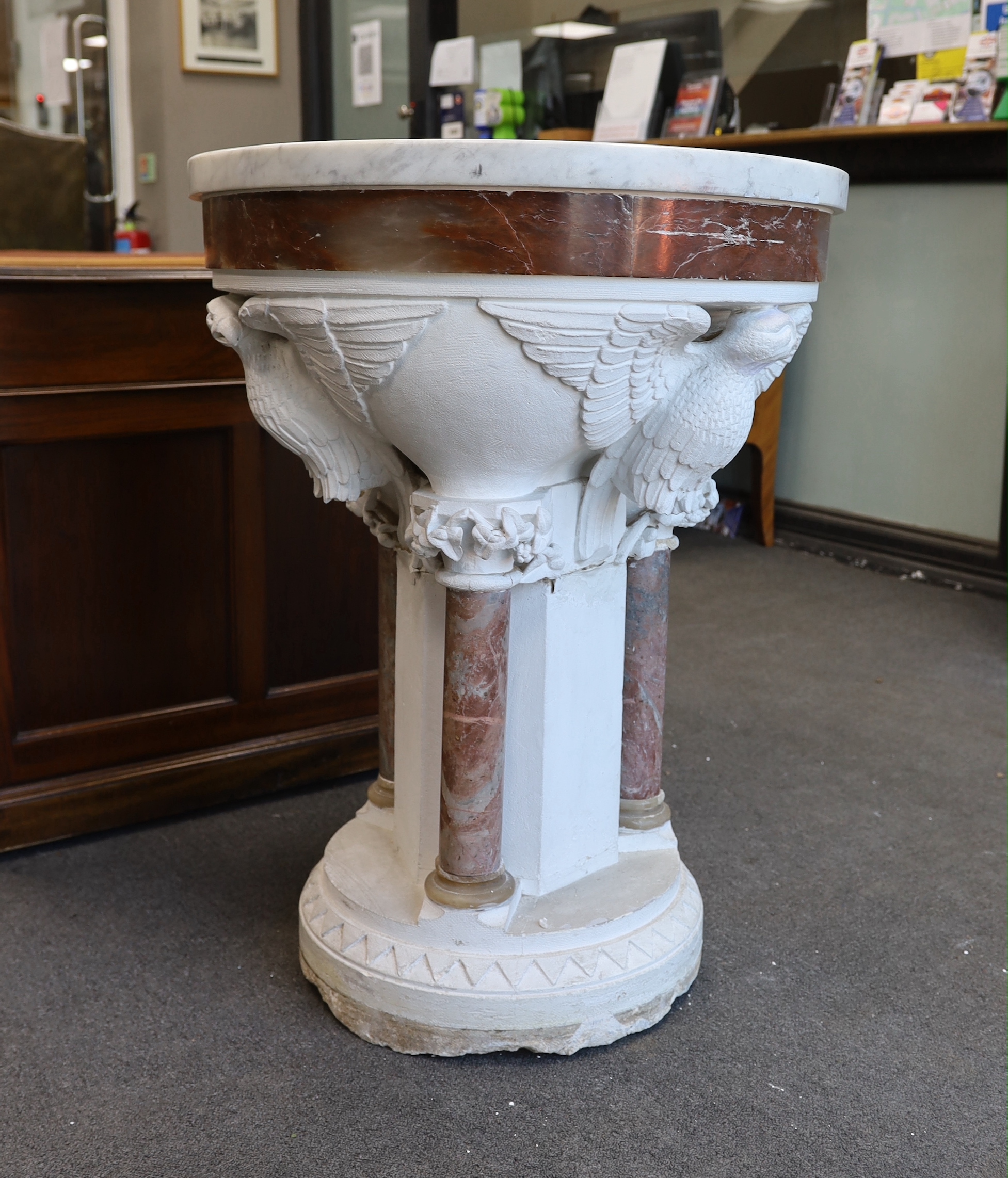A Victorian carved rouge marble font, top engraved 'One Faith One Baptism One Lord', diameter 68cm, height 89cm